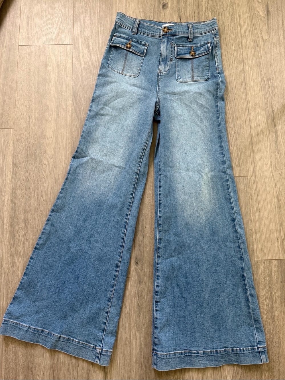 Vintage Wash Denim High Rise Patch Pocket Wide Flare Jeans